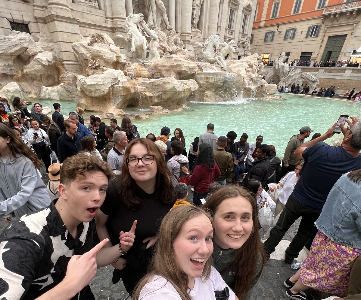 First Gen Abroad students at a fountain in Rome.